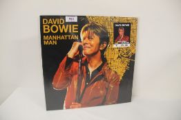A David Bowie Vinyl album - 226 of 500 red splatter vinyl - Manhattan Man NYC 1O / May / 2002