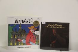 A David Bowie two record lot at per photo - both NM