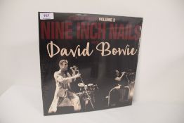 A David Bowie Vinyl album - Back in Anger w / Nine Inch Nails Volume 2 sealed double