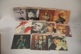 A David Bowie 11 x 45 lot - UK editions and pictured