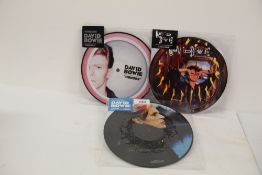 A lot of three David Bowie 40th Anniversary pic discs - mint copies 'sound and vision ' ' zeroes '