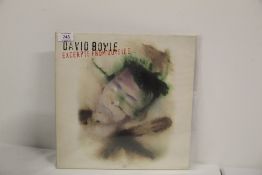 A David Bowie ' excerpts from the outside ' in ex/ ex - rare vinyl issue of his electro /