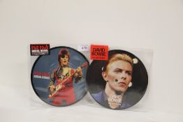 A lot of two David Bowie 40th Anniversary pic discs - mint copies ' rebel rebel ' and ' golden years
