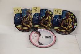 A rare copy of the ' Heroes' pic disc 40th anniversary edition with three copies of the DJ pic
