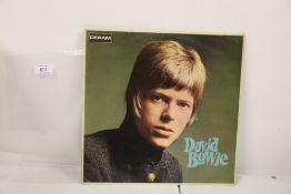 A David Bowie German OG of his debut - a rare piece in VG / VG+ - needs a pro clean but in lovely