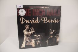 A David Bowie Vinyl album - Back in Anger w / Nine Inch Nails Volume 1 sealed double