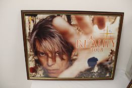 A David Bowie lot of three framed prints