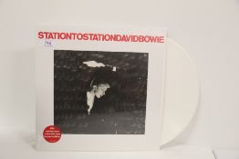 A David Bowie -station to station red vinyl album in shrink