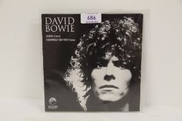 A David Bowie 45 of early Demos on grey marbled vinyl
