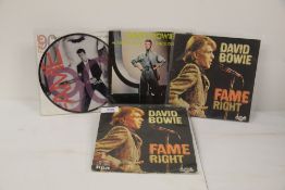 A David Bowie four x 45 lot - various Euro picture sleeves