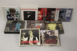 A David Bowie lot of ten compact discs - limited editions and regular releases - a classic back