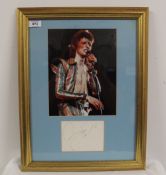 A David Bowie 'signed ' framed photo - despite certificate of authenticity we cannot verify