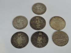 Four Austrian Restike 1780 M.Theresa Silver Thalers and two 1937 GB Silver Crowns and a 1935 GB