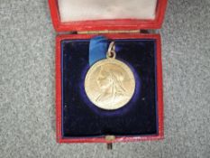 A Gold Victorian 1897 Diamond Jubilee Medallion with ring attached in original box