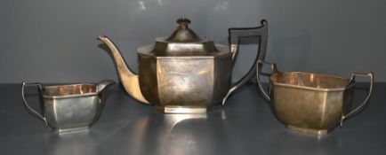 A 1930's silver three piece teaset, of canted rectangular form with angular handles, marks for