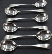 A set of six Edwardian silver Old English pattern soup spoons, each with pip reverse and engraved