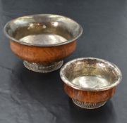 A 19th century Chinese white metal mounted burr wood mazer bowl, of turned form with white metal