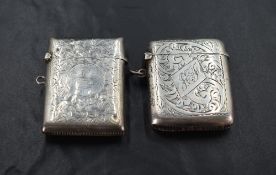 A George V silver vesta case, of hinged rectangular form, curved for the gentleman's pocket and