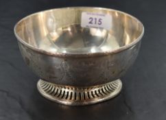 An Edwardian Silver Bowl having engraved swag and bow pattern with perforated foot, dated 1909,