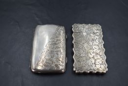An Edwardian silver cigarette case, of rectangular form with sprung hinge and half engraved