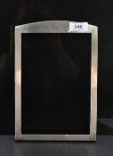 A George V silver photograph frame, of rectangular form with arched surmount, marks for Birmingham