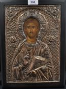 A modern Greek embossed white metal religious icon, a depiction of Jesus with hand painted detail to