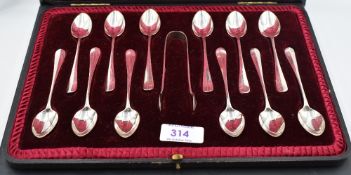 A cased set of twelve late Victorian teaspoons & sugar tongs, Hanovarian varient with rat tail