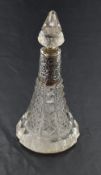 An Edwardian cut glass perfume bottle of conical form having cut glass stopper and moulded silver