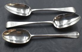 A pair of Old English pattern serving spoons, each with pip reverse and engraved initials, marks for