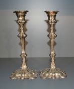 A pair of silver plated candlesticks, of classical design with removable sconces, marked for