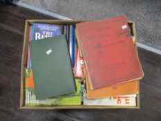 A box of mixed text and reference books of military and war interest