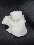 A 20th century natural stone carved figure.