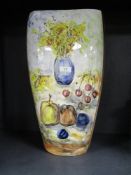 A large 1960s Italian floor vase having fruit and flower design, signed E Montanelli, 63.