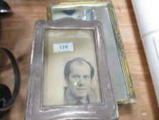 A small sized Barbola mirror with an Art Deco HM silver photoframe