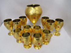 A selection of vintage gilt finish glasses, goblets and similar.