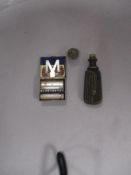 A miniature 1920s Myatt ladies razor and a metal bodied souvenir seal with screw fastening for