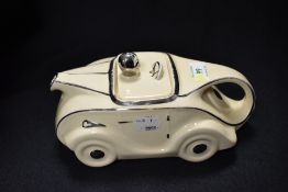 An Art Deco era Sadler race car design teapot in white glaze