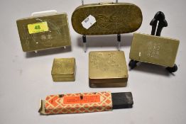 Four antique Chinese brass ink or opium containers all heavy set with copper liners and having chase