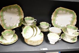 An early 20th century Radfords Fenton ' Naples ' tea service with gilt and green design