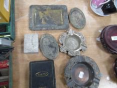 A group of six Japanese cast-metal trays and ashtrays, to include a reproduction Dalvey pocket