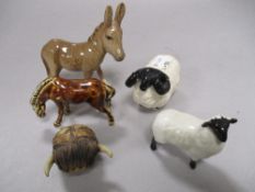 A collection of animal studies including Beswick ram and donkey.