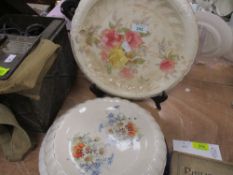 A group of four Victorian pottery circular stands, one blue and white the remainder floral