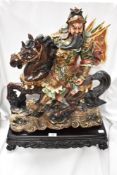 A large 20th century composite figure study of a Mogul warrior of horse back with plinth 60cm tall