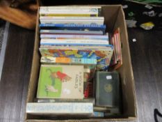 A box of mixed children's story books and nursery rhymes
