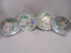 Two plates and two bowls having oriental design with key motif to borders, around late 19th early