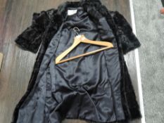 A selection of vintage ladies fur jackets including full length sheep skin