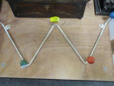 A mid century Atomic coat or hat rack