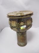 An impressive piece of studio pottery with mottle brown and grey glaze with applied decoration to
