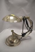 A modern Art Deco design desk top lamp with chrome finish