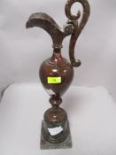 A Victorian red granite ornamental ewer on stand, AF.